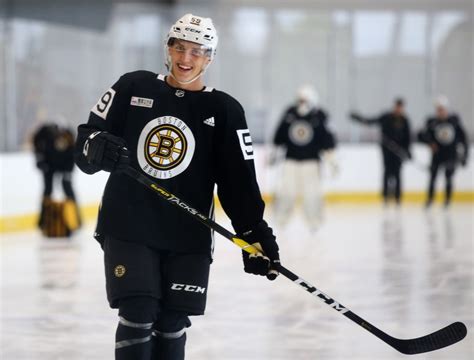Bruins prospects give back around Boston while training with the pros at development camp